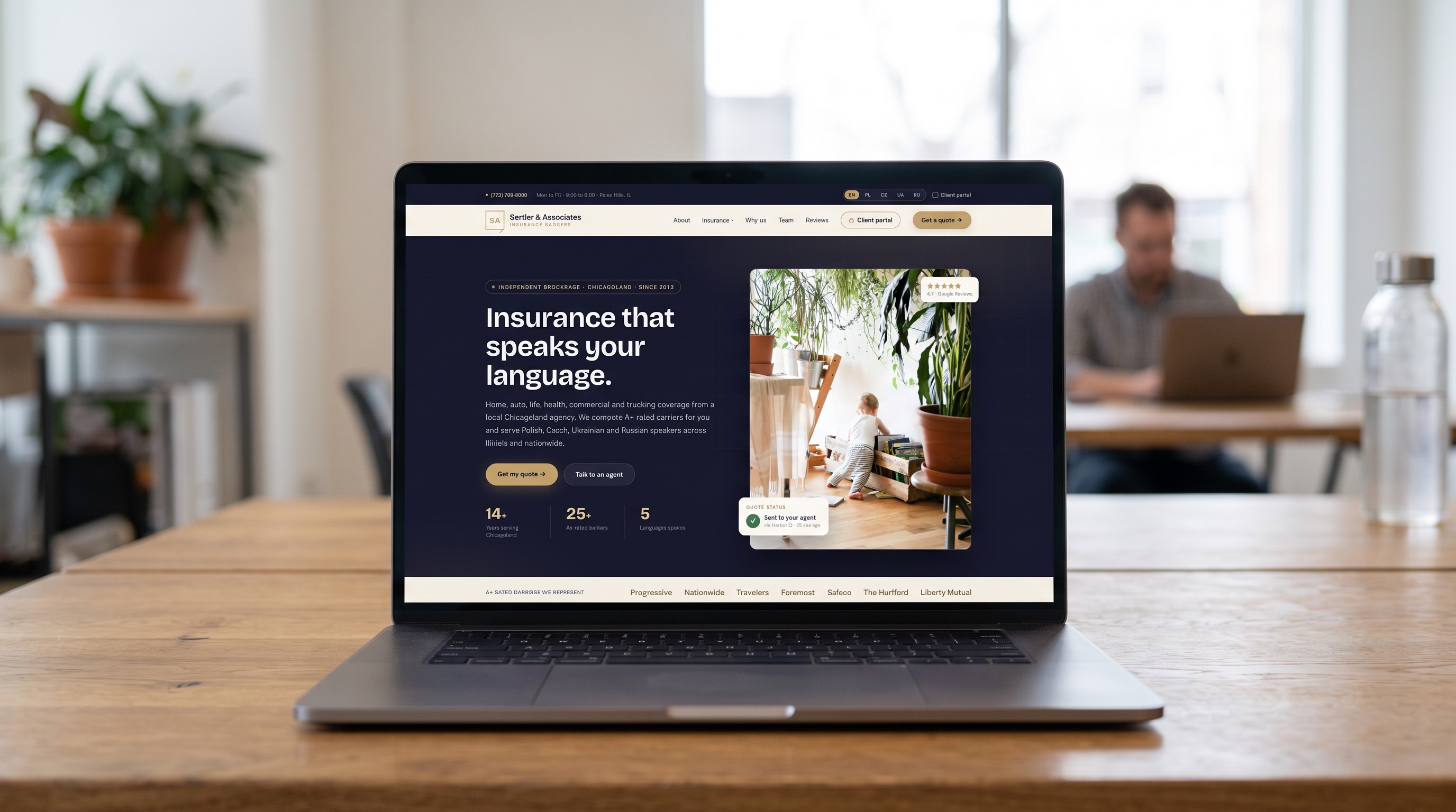 Sertler & Associates website displayed on a laptop